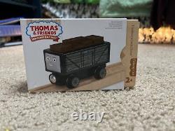 Wooden James with two different styles of troublesome trucks. Mint condition