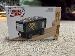 Wooden James with two different styles of troublesome trucks. Mint condition